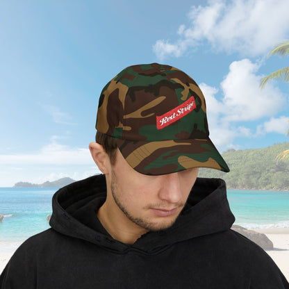 Jamaica Red Stripe Beer Logo Classic Dad Hat. The hat is a casual, curved-brim style with a structured front panel, featuring the Red Stripe Beer logo embroidered prominently in the center. The logo includes the signature red diagonal stripe and text, symbolizing the authentic Jamaican beer brand. The hat comes in a classic yet relaxed vibe, making it an ideal gift for beer enthusiasts, fathers, or anyone celebrating Jamaican heritage.