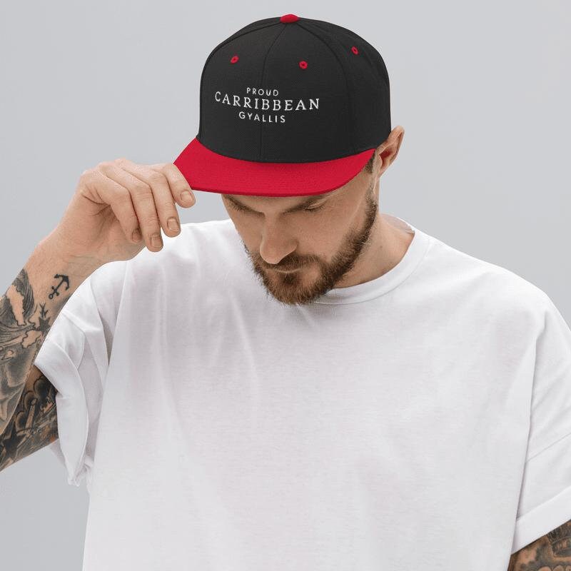 Proud Caribbean Gyallis Snapback Hat featuring a  island quote and tropical vibes. This stylish dad cap is perfect for any Rasta reggae lover Made for West Indies pride, it&#39;s the ultimate headwear for showcasing Caribbean culture.