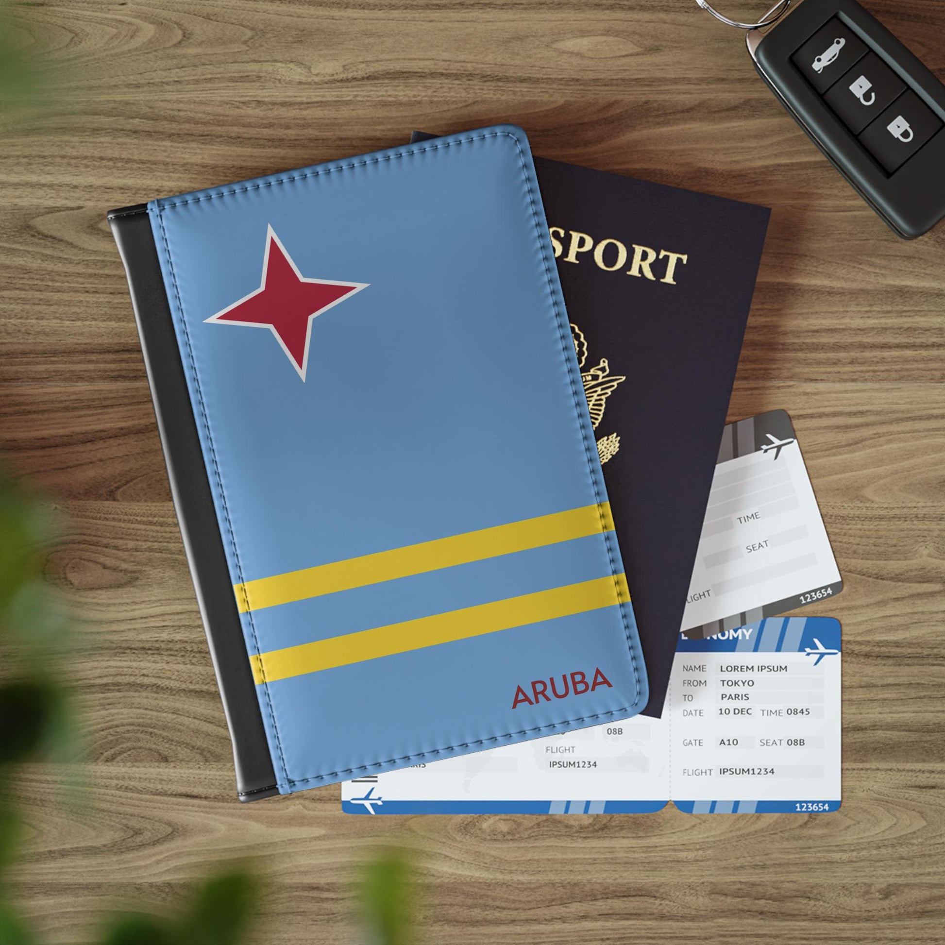 A sleek faux leather passport cover featuring the vibrant flag Aruba, with the country&#39;s name displayed in a stylish font. This travel accessory offers RFID-blocking protection and compartments for cards and boarding passes.