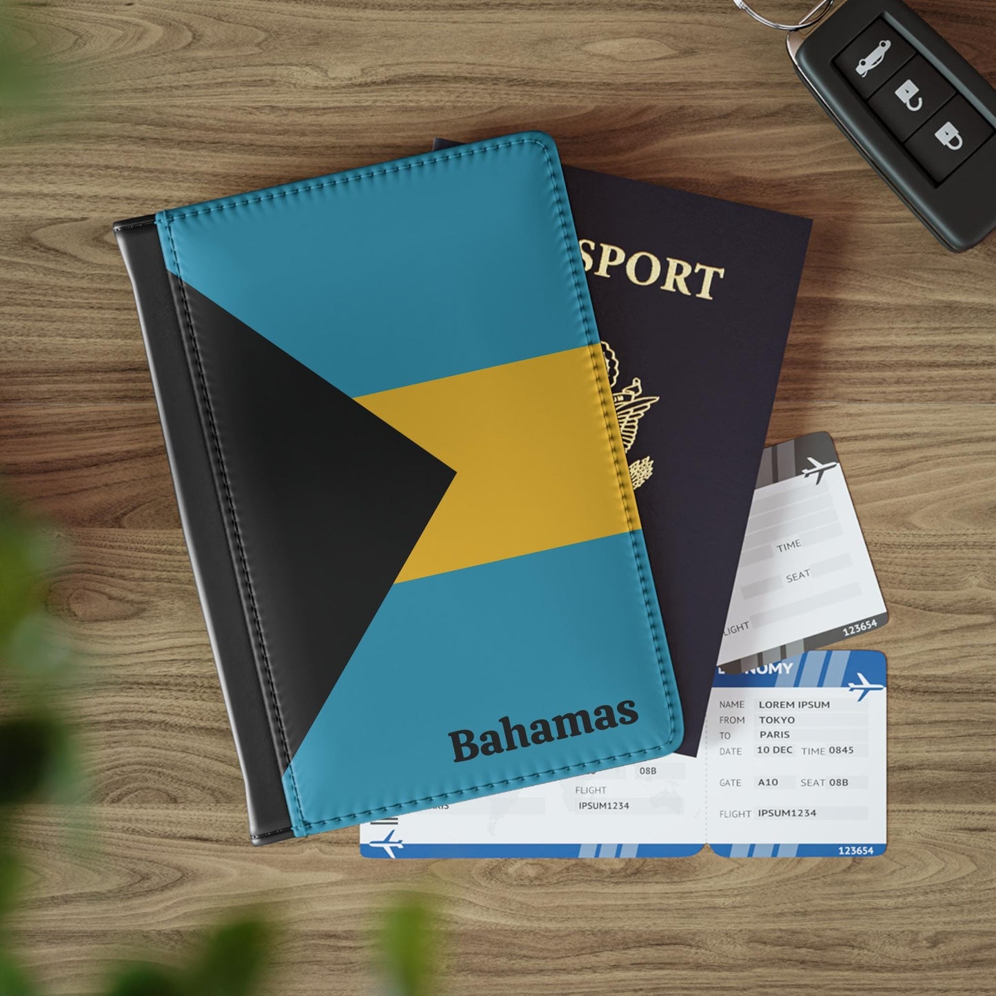 A sleek faux leather passport cover featuring the vibrant flag Bahamas, with the country&#39;s name displayed in a stylish font. This travel accessory offers RFID-blocking protection and compartments for cards and boarding passes.