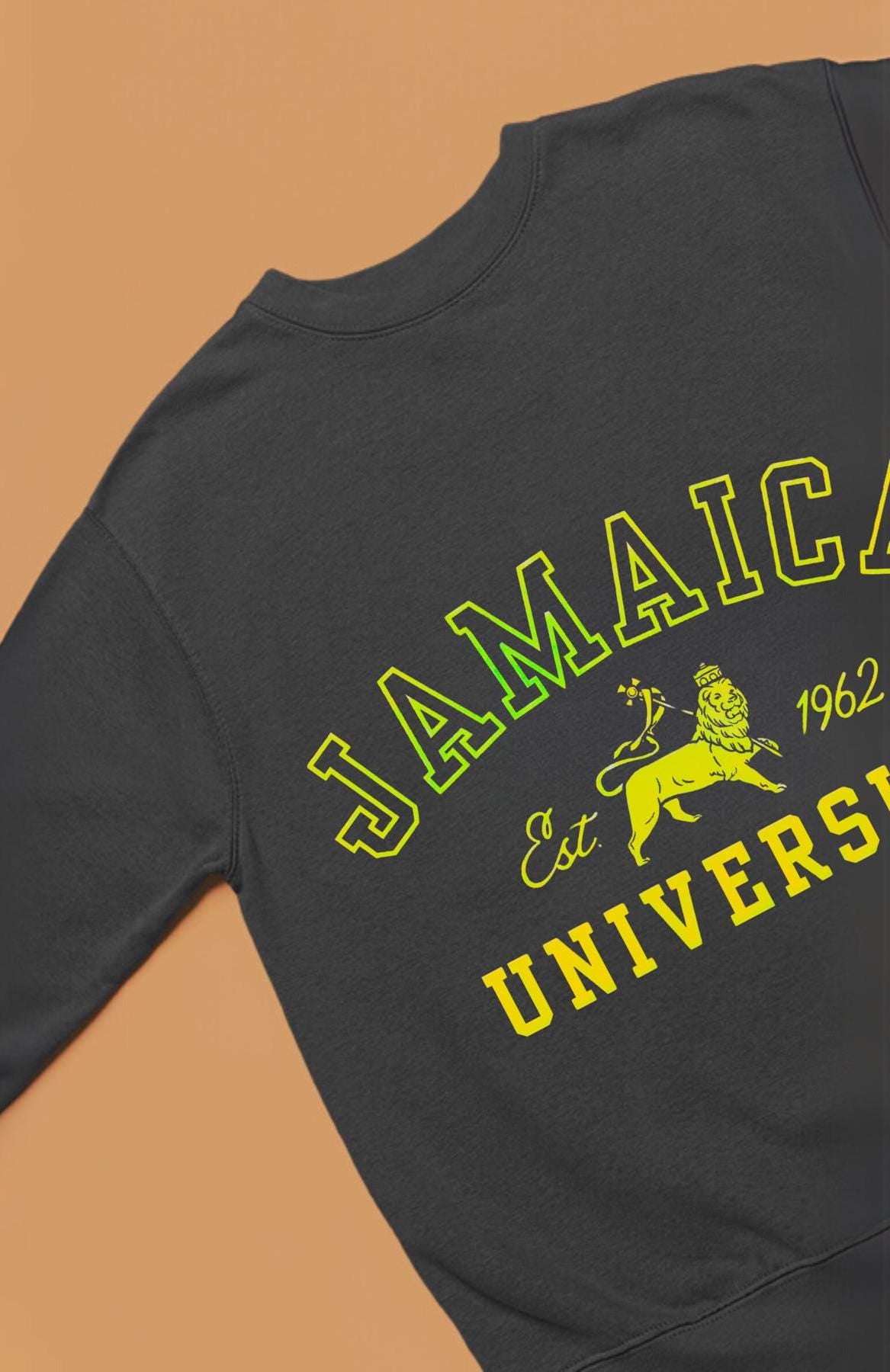 A stylish unisex sweatshirt featuring a bold Lion of Judah design with vibrant Jamaican colors, celebrating Jamaica’s independence. This versatile piece is perfect for Independence Day, cultural celebrations, or as Caribbean-inspired college apparel.