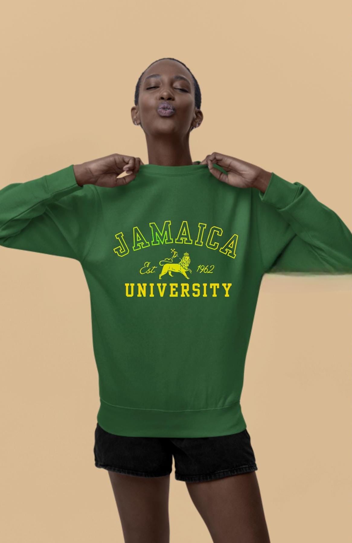 A stylish unisex sweatshirt featuring a bold Lion of Judah design with vibrant Jamaican colors, celebrating Jamaica’s independence. This versatile piece is perfect for Independence Day, cultural celebrations, or as Caribbean-inspired college apparel.