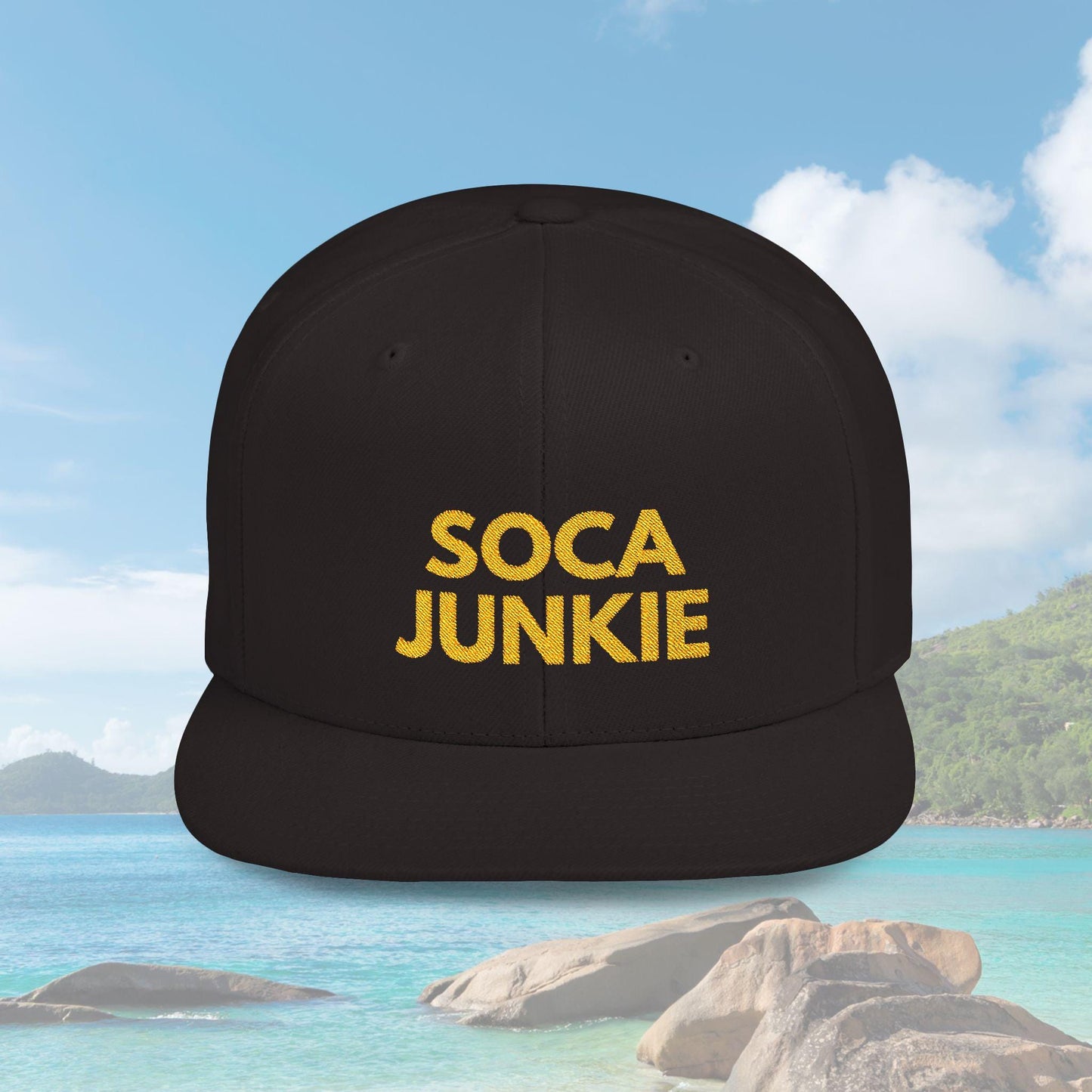 A sleek black snapback hat with &quot;Soca Junkie&quot; embroidered in bold, vibrant lettering on the front. This stylish cap is perfect for carnival fetes, music festivals, or everyday wear, celebrating Caribbean culture and Trinidad & Tobago vibes.