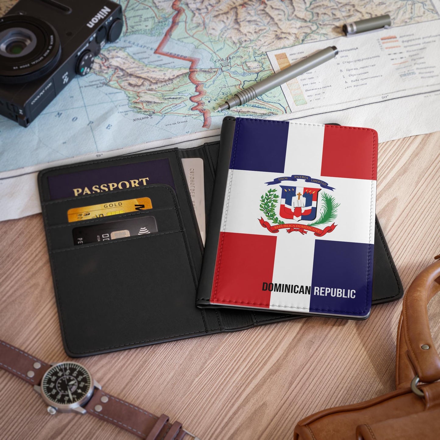 A sleek faux leather passport cover featuring the vibrant flag Dominican Republic, with the country&#39;s name displayed in a stylish font. This travel accessory offers RFID-blocking protection and compartments for cards and boarding passes.