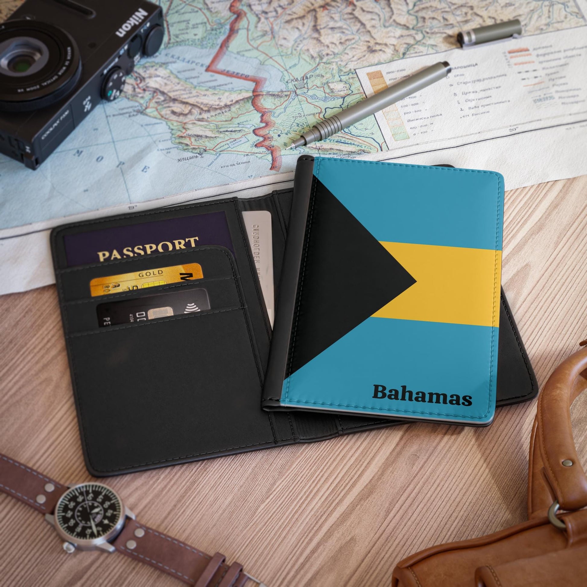 A sleek faux leather passport cover featuring the vibrant flag Bahamas, with the country&#39;s name displayed in a stylish font. This travel accessory offers RFID-blocking protection and compartments for cards and boarding passes.