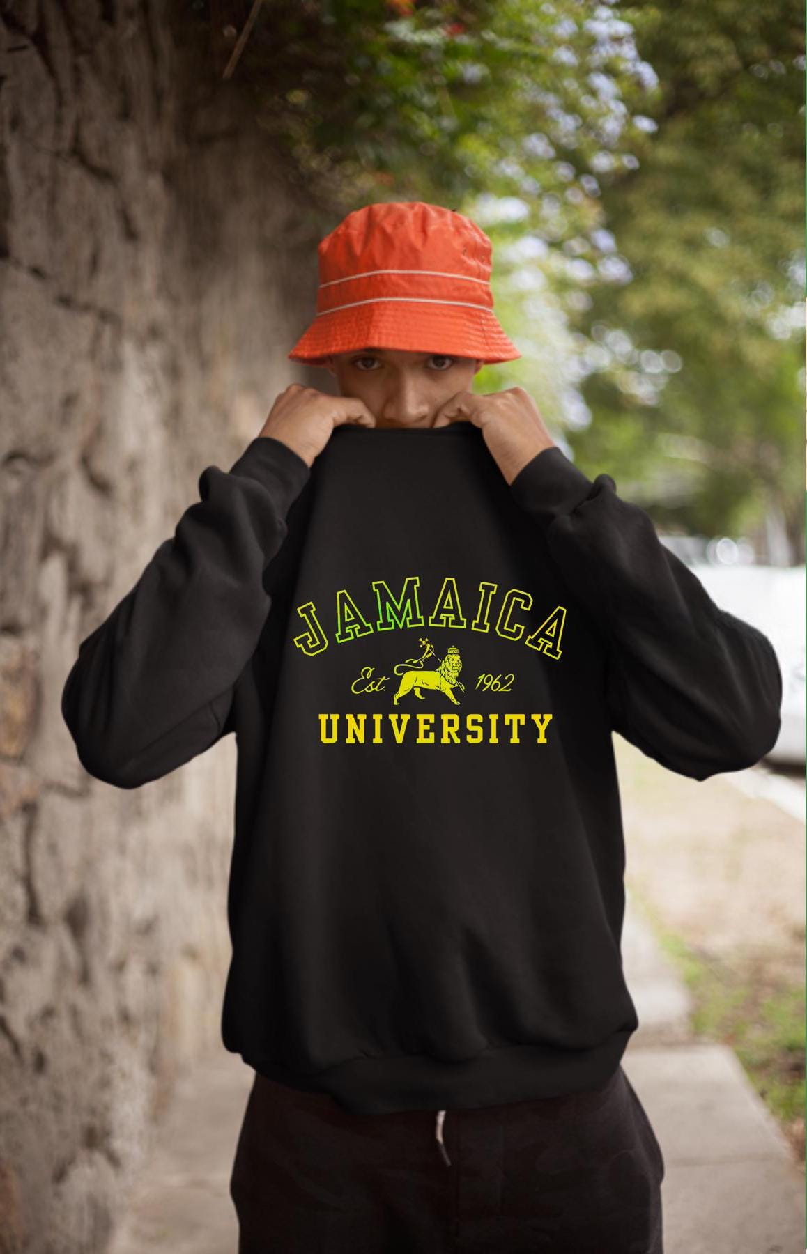 A stylish unisex sweatshirt featuring a bold Lion of Judah design with vibrant Jamaican colors, celebrating Jamaica’s independence. This versatile piece is perfect for Independence Day, cultural celebrations, or as Caribbean-inspired college apparel.