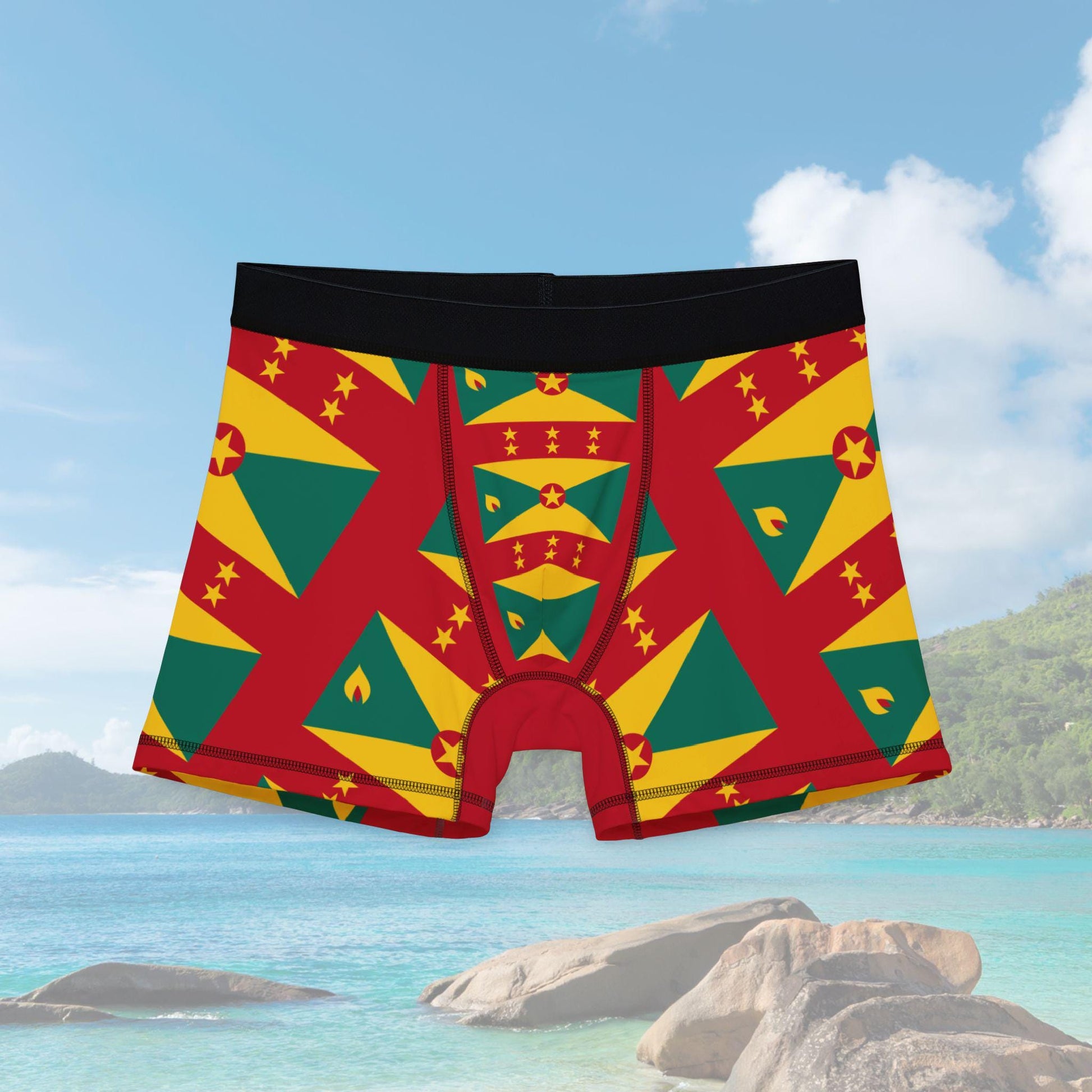 Boxer briefs featuring the Grenada flag pattern in vibrant red, yellow, and green with black waistband. The tone is bold and patriotic.