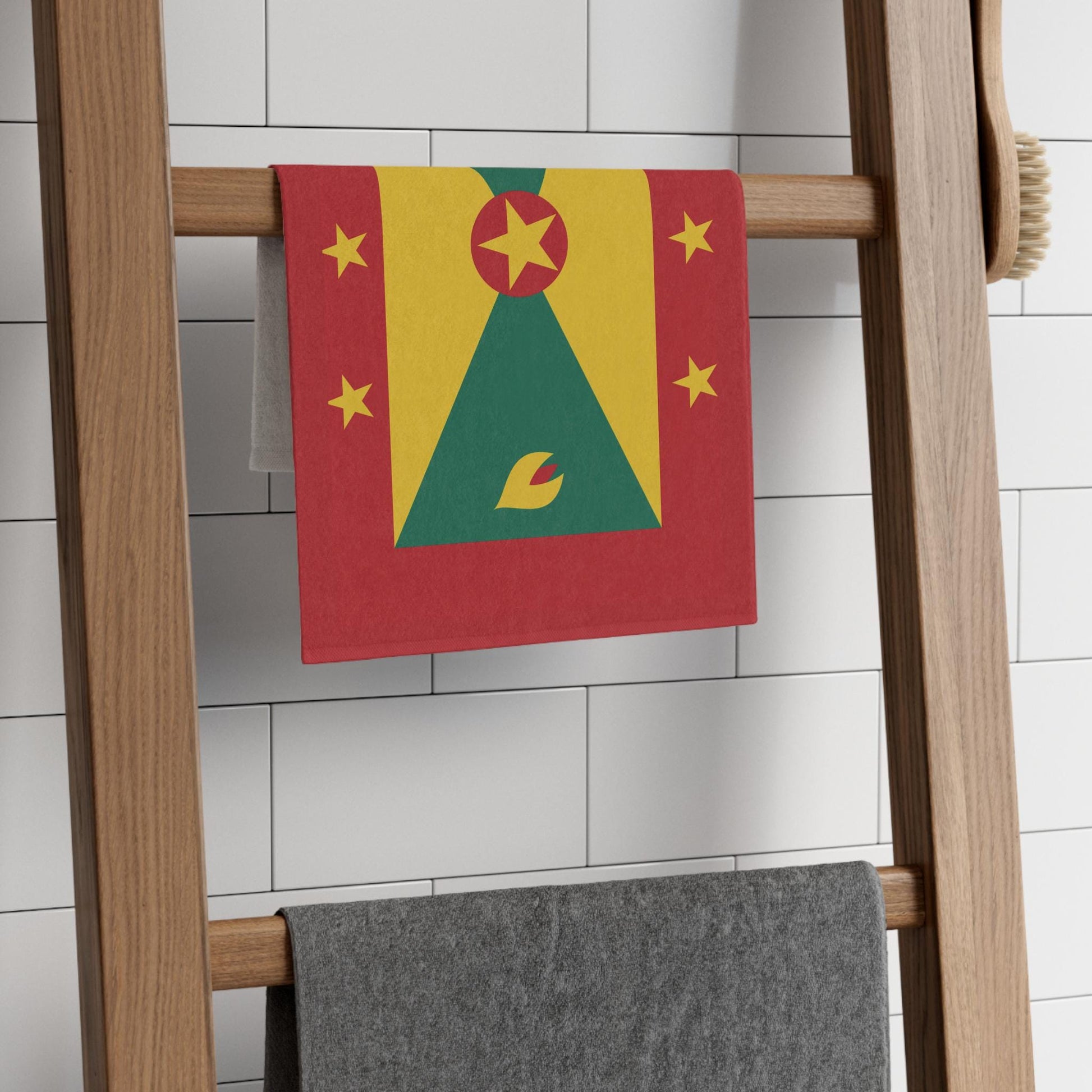 Grenada Flag Towel: Flag with a red background and a yellow, green pattern. A central red circle with a yellow star, surrounded by six yellow stars. Vibrant and bold Grenadian Rag for carnivals, fetes, and parties.