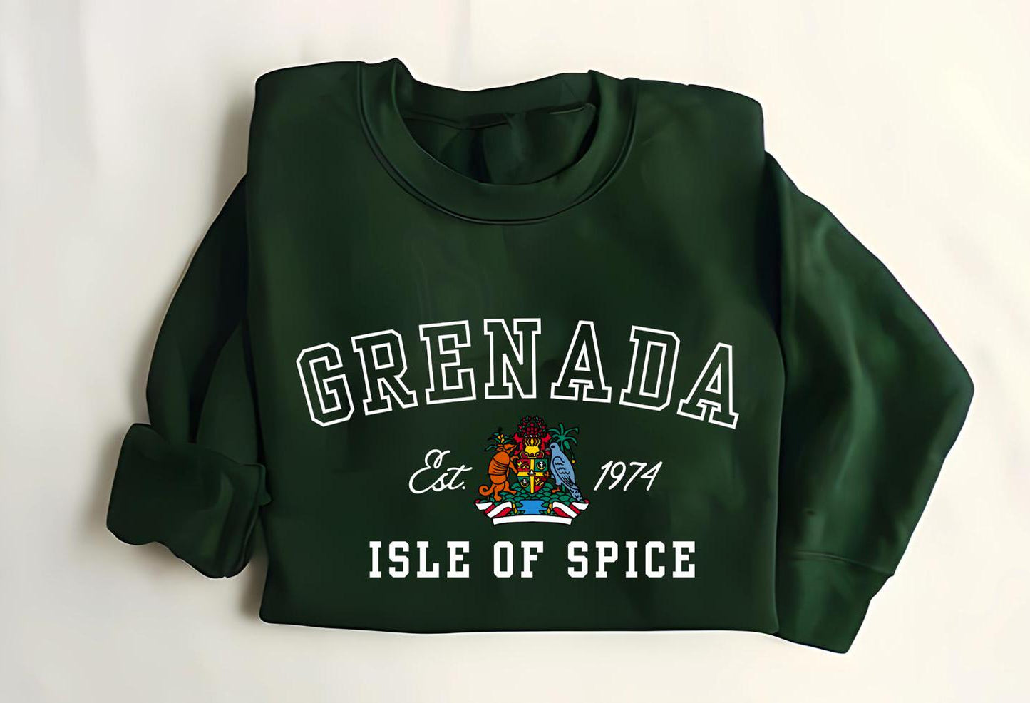 Grenada-inspired varsity sweatshirt featuring the Grenada flag graphic, the island’s independence year, and the Coat of Arms. This stylish sweatshirt showcases bold colors and a design celebrating Grenada’s rich heritage.