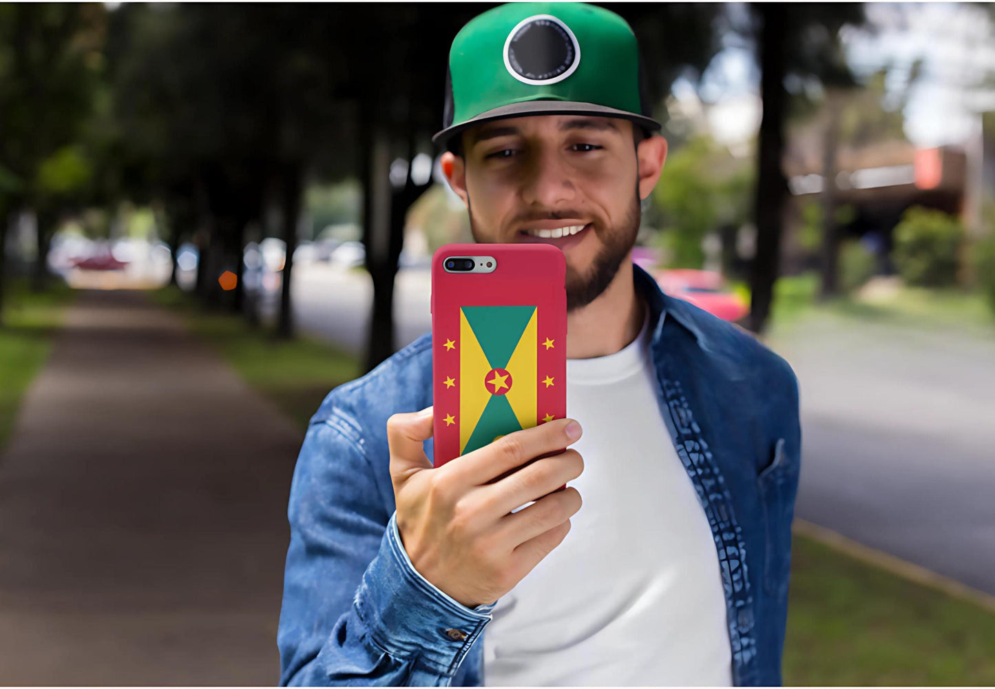 A durable Grenada Flag Tough Phone Case designed to fit iPhone, Samsung, and Google devices. This protective phone case features a Grenada flag design, showcasing the iconic yellow, green, and red color scheme with the star emblem and nutmeg symbol.