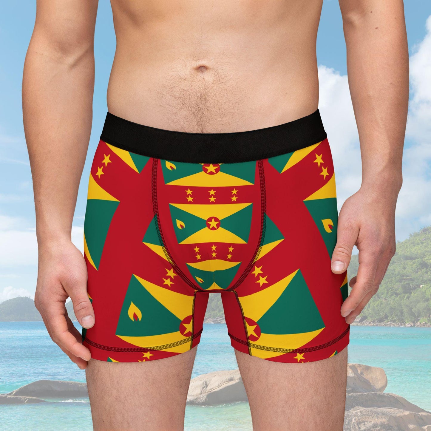 Boxer briefs featuring the Grenada flag pattern in vibrant red, yellow, and green with black waistband. The tone is bold and patriotic.