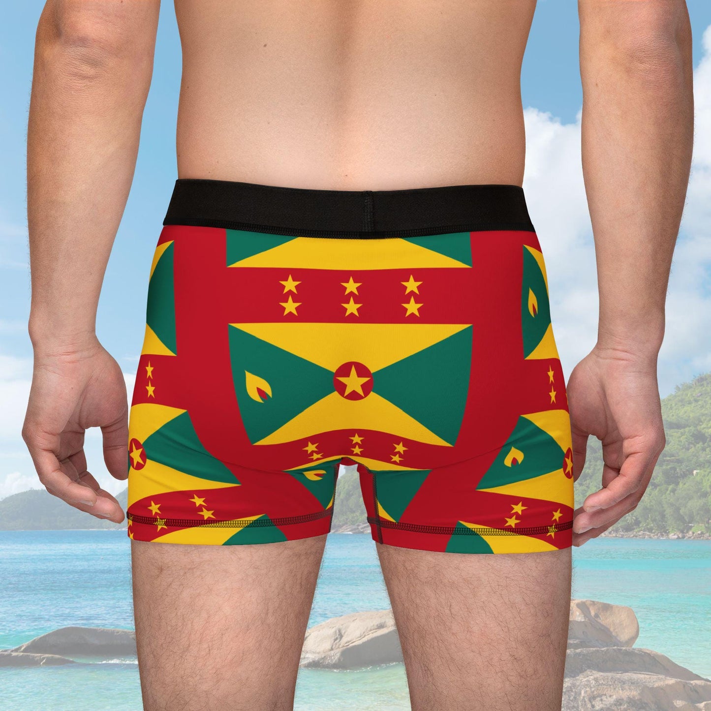 Boxer briefs featuring the Grenada flag pattern in vibrant red, yellow, and green with black waistband. The tone is bold and patriotic.